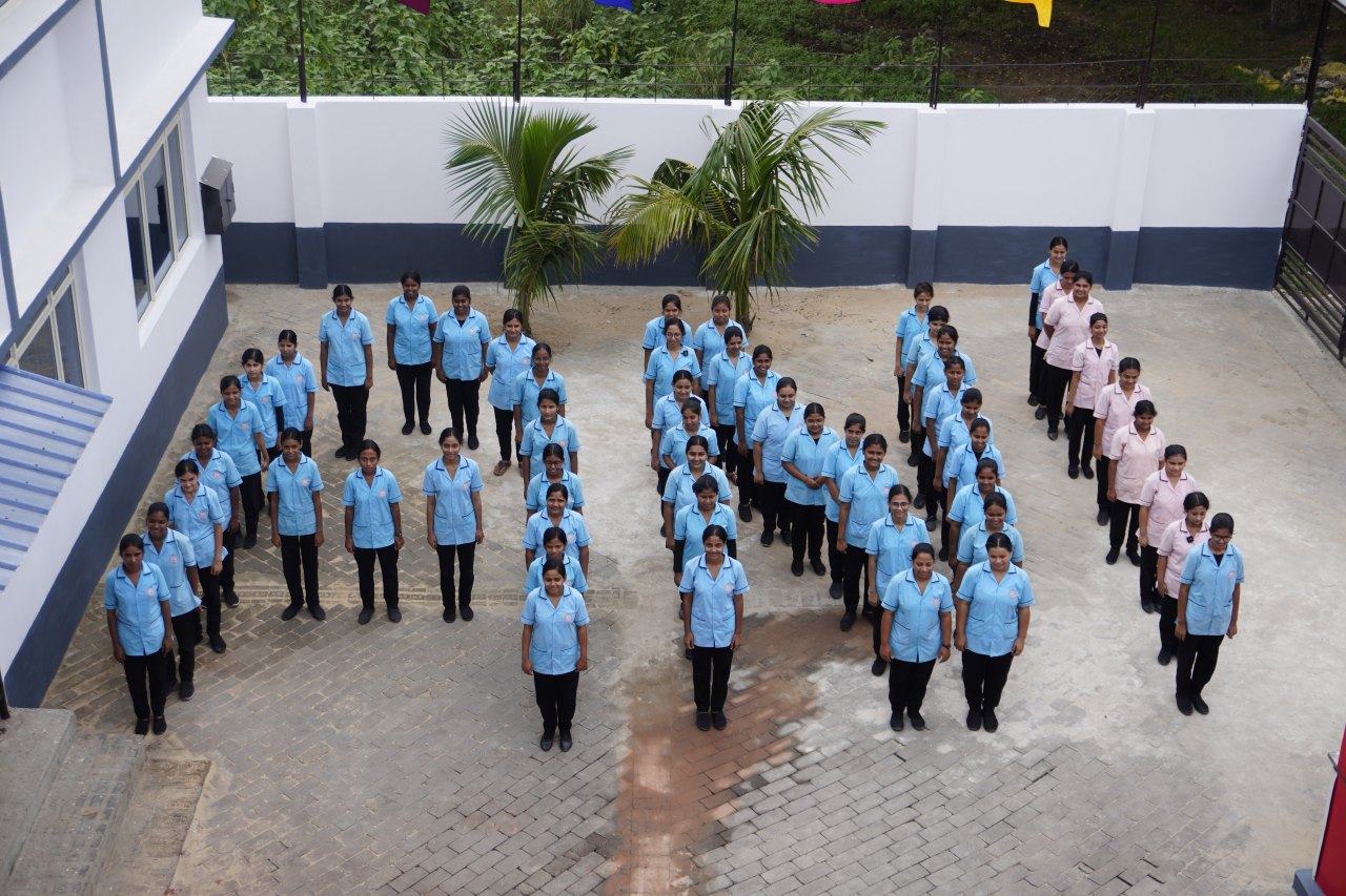 Morning assembly lines outside the Annapurna Nursing Institute building at Rajbandh