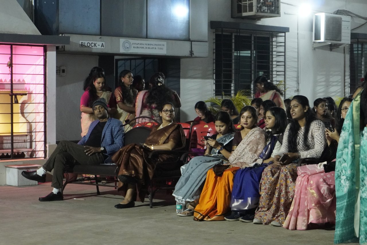 Audience at a programme outside Block A, Annapurna Nursing Institute