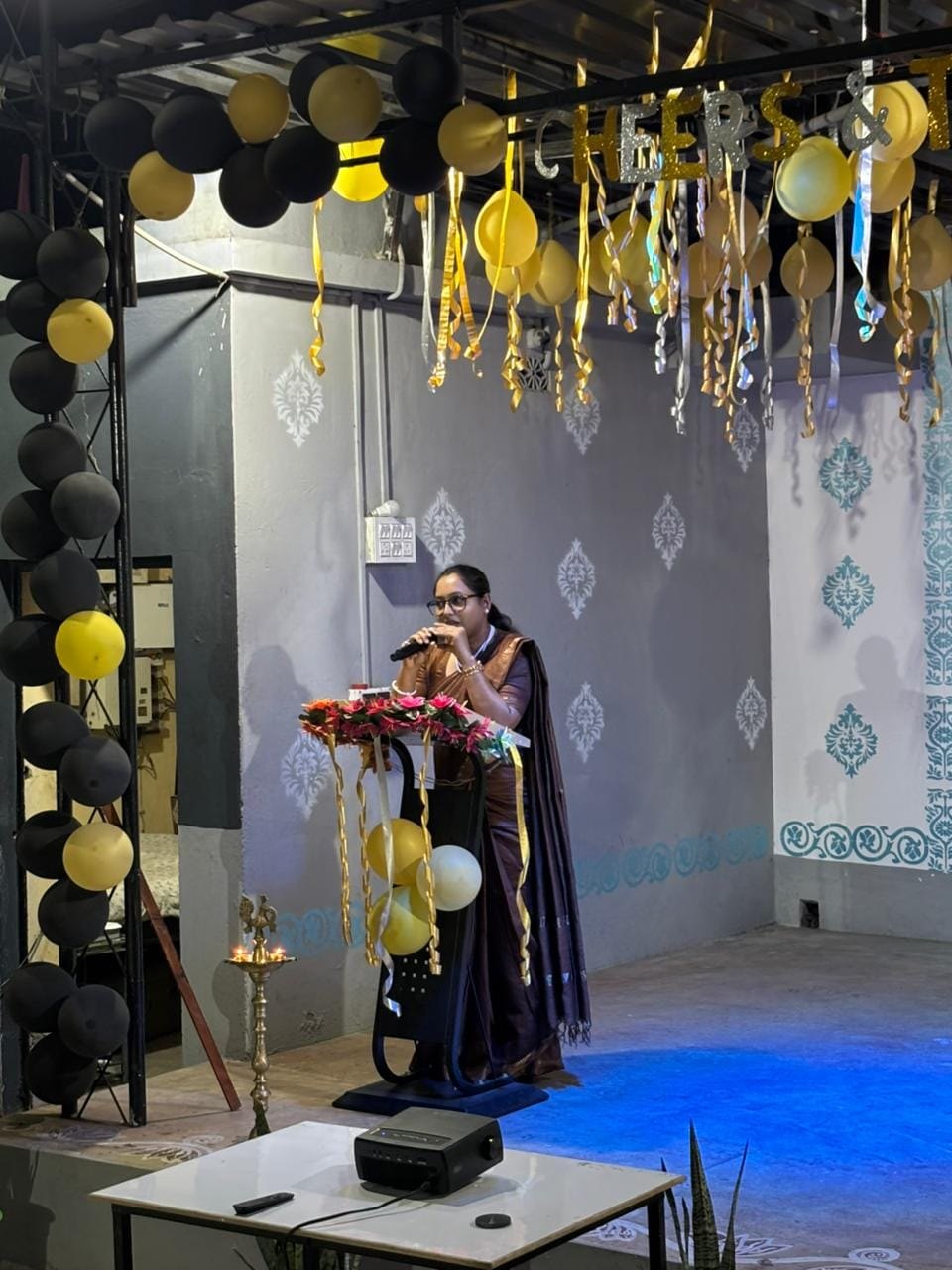 Faculty address from the stage at an institute programme